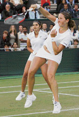 Sania Mirza (left) and Israel�s Shahar Peer in action during their first-round match against Sweden�s Sofia Arvidsson and Lilia Osterloh of the USA at Wimbledon in London on Friday.
