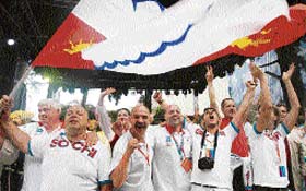 Russian supporters celebrate after the announcement that the 2014 Winter Olympics will be held in Sochi at the 119th IOC session in Guatemala City