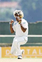 Sri Lanka�s Lasith Malinga celebrates after dismissing Bangladesh�s Javed Omer on the first day of the third and final Test at the Asgiriya Stadium in Kandy on Wednesday.