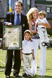 Pete Sampras with his wife Bridgette and sons Ryan (right) and Christian after being inducted into the International Tennis Hall of Fame in Newport