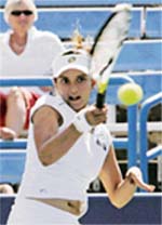 Sania Mirza hits a volley during her quarterfinals match against Olga Govortsova of Belarus at the Western & Southern Financial Group Women�s Open in Mason, Ohio (USA)