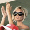 Victoria Beckham cheers her husband.