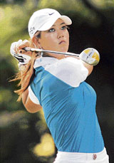 Michelle Wie of the USA drives off the third tee during the second round of the 14th women�s Golf Masters in Evian, France