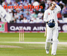 Sensing defeat! England captain Michael Vaughan leaves the field after being dismissed by Zaheer Khan at Trent Bridge on Monday.