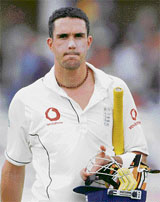 England's Kevin Pietersen leaves the field after his dismissal during the fourth day of their second Test against India on Monday.