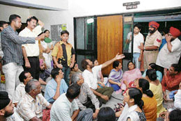 MBBS candidates and their parents protest during counselling at Government Medical College in Amritsar on Thursday.