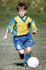 Manchester United have signed nine-year-old Australian soccer prodigy Rhain Davis after his grandfather sent a DVD of the boy in action to the English Premiership champions.