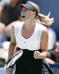 Maria Sharapova of Russia celebrates match point as she defeats Sania Mirza of India during their quarter-final match at the Acura Classic tennis tournament in Carlsbad, California on Saturday.
