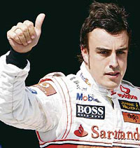 McLaren driver Fernando Alonso of Spain gestures after winning the qualifying session of the Hungarian F1 Grand Prix at the Hungaroring racetrack in Budapest on Saturday.