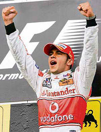 McLaren driver Lewis Hamilton celebrates on winning the Hungarian Formula One Grand Prix at the Hungaroring racetrack in Budapest