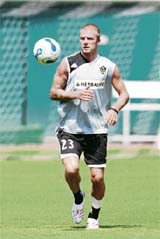 British soccer star David Beckham of the US Major League Soccer (MLS) Los Angeles Galaxy trains at RFK Stadium in Washington on Wednesday.