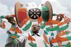 Jagmohan Kanojia displays kites in the colours of the national flag adorning images of freedom fighters at his workshop in Amritsar