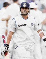 Sachin Tendulkar leaves the field after being dismissed by James Anderson. 