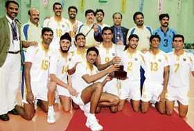 Indian captain P.S.Srikanth (C) poses along with his team as they won Lanco Cup after winning the fifth and the final Test of the India-Pakistan volleyball Test series in Hyderabad on Tuesday. India won the final Test by 25-14, 25-25, 25-23, clinching the series by 4-1. 
