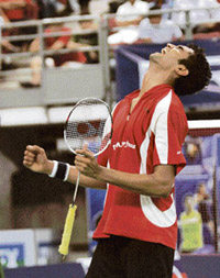 Anup Sridhar celebrates after winning his men's singles match against Indonesia's Taufik Hidayat at the World Badminton Championships in Kuala Lumpur 