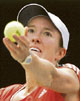 Belgium�s Justine Henin prepares to serve against China�s Peng Shuai during the third round of the Rogers Cup tennis tournament in Toronto on Thursday.