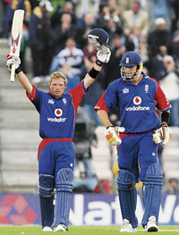 Ian Bell (L) celebrates scoring a century against India with teammate Kevin Pietersen during the first NatWest one-day international