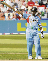 Sachin Tendulkar acknowledges the crowd after completing his fifty during the second one-dayer against England at the County Ground in Bristol 
