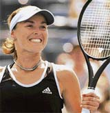 Switzerland�s Martina Hingis rejoices after defeating France�s Pauline Parmentier during the second round of the US Open in Flushing Meadows, New York, on Thursday. 