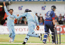 Sourav Ganguly celebrates with Mahendra Singh Dhoni after dismissing England�s Matt Prior at Leeds