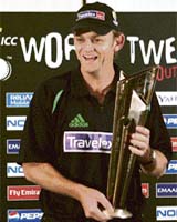 Australia�s vice-captain Adam Gilchrist holds the ICC Twenty20 World Cup trophy after a press conference in Johannesburg