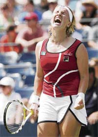 Svetlana Kuznetsova of Russia celebrates after defeating Victoria Azarenka of Belarus 6-2, 6-3 at the US Open in Flushing Meadows