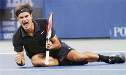 Roger Federer of Switzerland celebrates winning his match against Novak Djokovic of Serbia in the men's final of the U.S. Open tennis tournament in Flushing Meadows, New York, on Sunday.