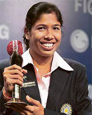 Jhulan Goswami holds the trophy after she was named the Women�s Cricketer of the Year during the ICC Awards ceremony.