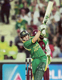 South African batsman Herschelle Gibbs hits the ball off West Indies bowler Fidel Edwards during the Twenty20 world championship opening match at Wanderes in Johannesburg on Tuesday.