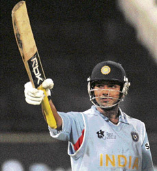Rohit Padbanaban Sharma acknowledges the crowd after he scored a half-century against South Africa during their Twenty20 World Cup match in Durban on Thursday. 