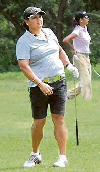 Simi Mehra (left) watches her shot as Nitika Jadeja looks on during the final day of the third leg of the Women�s Professional Golf Tour at the Chandigarh Golf Club on Friday.