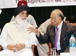 Chief Minister Parkash Singh Badal and Chief Justice of Punjab and Haryana High Court Vijender Jain at a function in Patiala on Saturday.