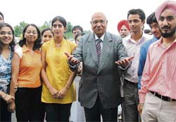 Lord Swraj Paul interacts with students of the Caparo PTU School of Manufacturing and Material Technology in Kapurthala on Saturday