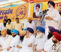 Chief Minister Parkash Singh Badal addresses a political conference at Chhapar on Thursday.