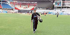 Australian cricketer Ricky Ponting walks back to the pavilion after a training session at the Chinnaswamy Stadium in Bangalore on Thursday.