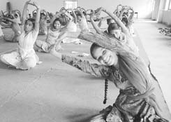 Students participate in yoga as part of a 10-day NSS camp at the Government Mohindra College in Patiala