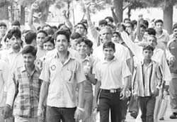 Youths take out a rally to mark the birth centenary of Shaheed Bhagat Singh at the Football Chowk in Patiala