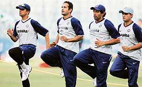 Rahul Dravid, Irfan Pathan, Robin Uthappa and Saurav Ganguly (L-R) jog during a training session in Bangalore
