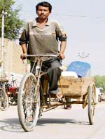 Beant Singh,younger grandson of late Hardit Singh Phuli, SAD leader, paddles a cart to earn his livelihood at Phuli village