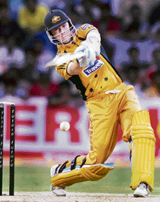 Australia�s Michael Clarke plays a shot during the first one-day international match against India at the Chinnaswamy Stadium in Bangalore on Saturday. 