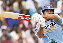 Yuvraj Singh plays a shot against Australia during their third one-day international in the Hyderabad on Thursday. It was 115-ball 121 from in-form Yuvraj that delayed the inevitable.