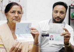 Gurjinder Singh Mahal and his mother, who were denied Canadian visa, in Amritsar