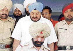 Former DGP S.S. Virk comes out of court complex in Rupnagar