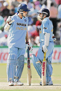 Sourav Ganguly (left) and Sachin Tendulkar gave India a solid start with a 91-run partnership. 