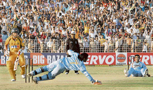 Australian batsman James Hopes looks helplessly as he fails to connect a Zaheer Khan delivery, the last of the 50th over, signalling victory for India at the Sector 16 Cricket Stadium at Chandigarh on Monday