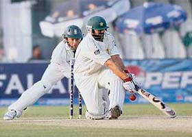 Pakistan's Inzamam-ul-Haq (R), who is making his final Test appearance at a ground where he made his debut in 1990, plays a shot against South Africa