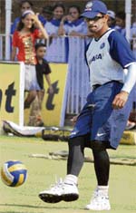 Rahul Dravid plays with a ball during the practice session, on the eve of fifth ODI against Australia at Reliance Stadium in Vadodara