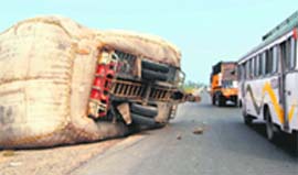 The overloading of vehicles continues in Haryana in the absence of regular police action against the violators. As a result of this practice, the sight of overturned tractor-trailers is not uncommon on the highways in the state. 