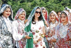 Minister of state for tourism Kiran Choudhary with girl students at an adventure camp at Morni.