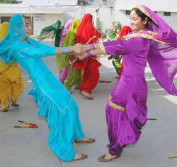 Girls perform during the inaugural day of the CBSE XV Cluster Basketball Tournament at Budha Dal Public School in Patiala on Thursday.